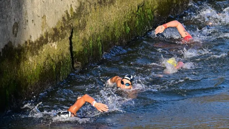 Swimmers Turn to Coca Cola to Combat Infections in Seine River scaled